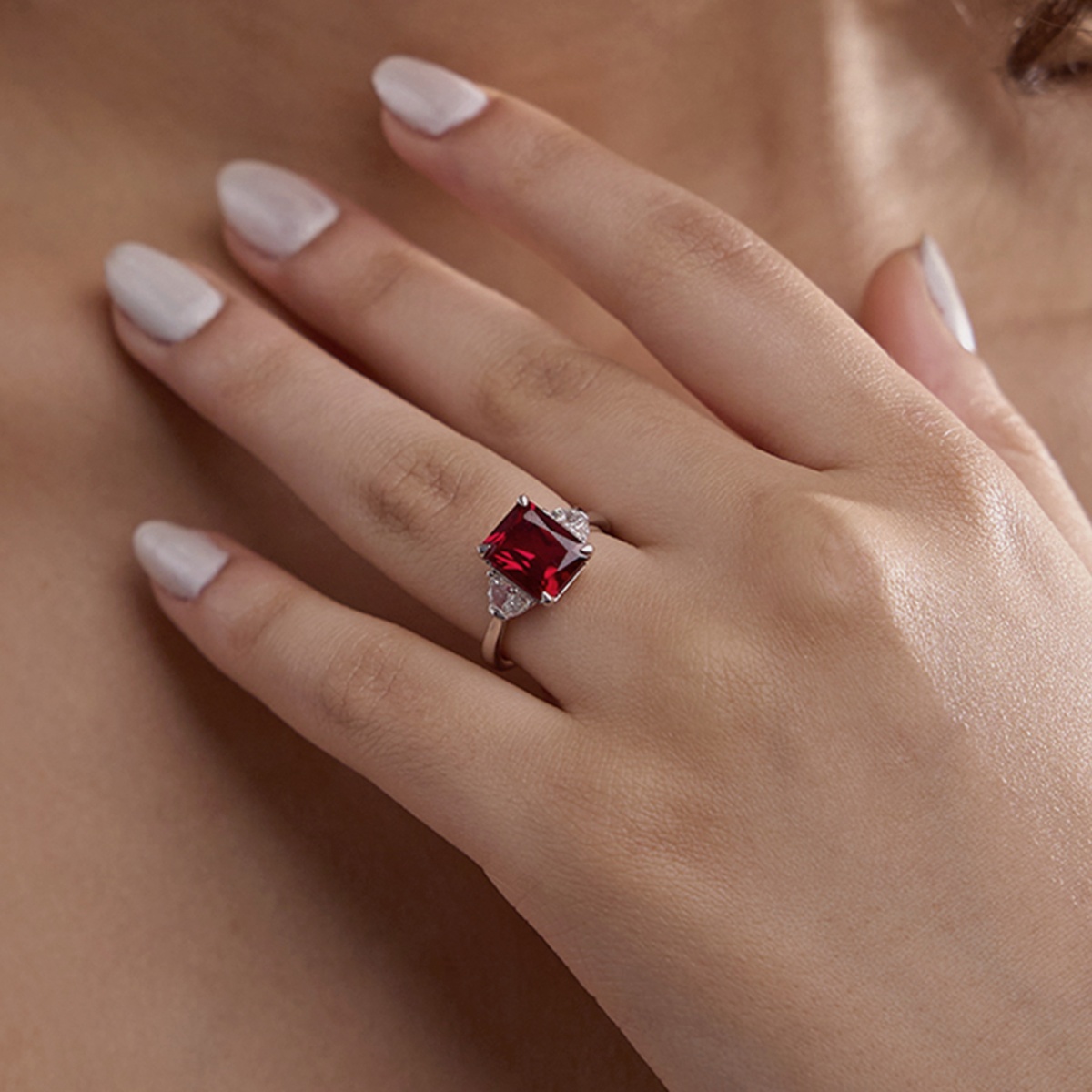 10x8mm Radiant Cut Created Ruby and 5/8 ctw Lab Grown Diamond Three-Stone Engagement Ring