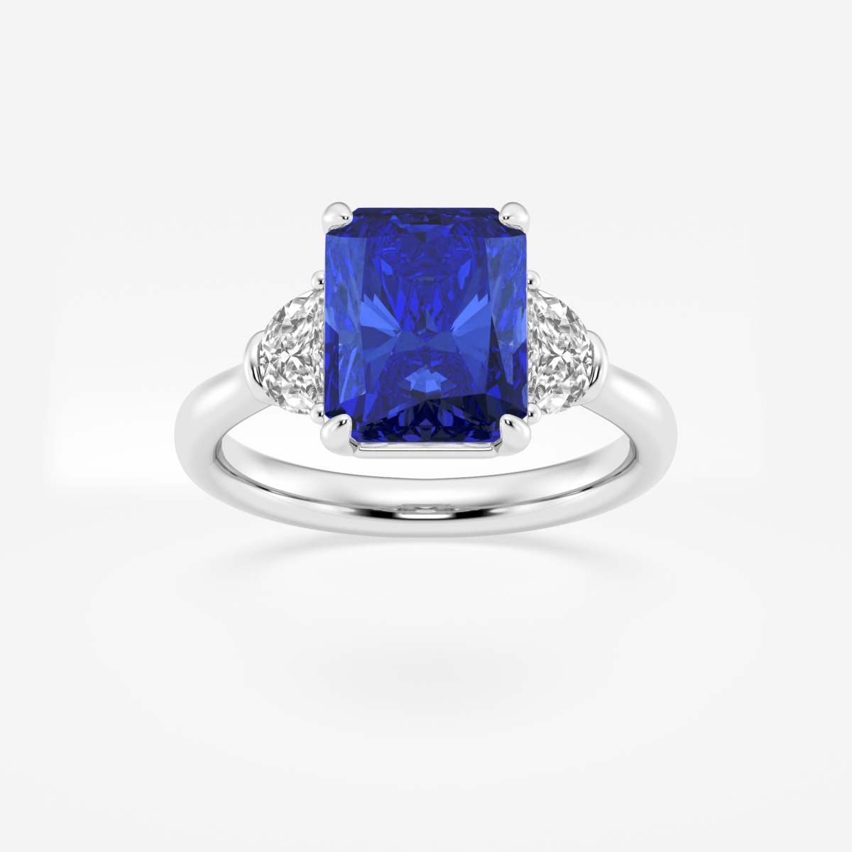 10x8mm Radiant Cut Created Sapphire and 5/8 ctw Lab Grown Diamond Three-Stone Engagement Ring