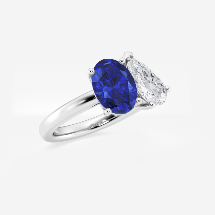 9x7mm Oval Cut Created Sapphire and 1 1/2 ctw Pear Cut Lab Grown Diamond Two Stone Engagement Ring
